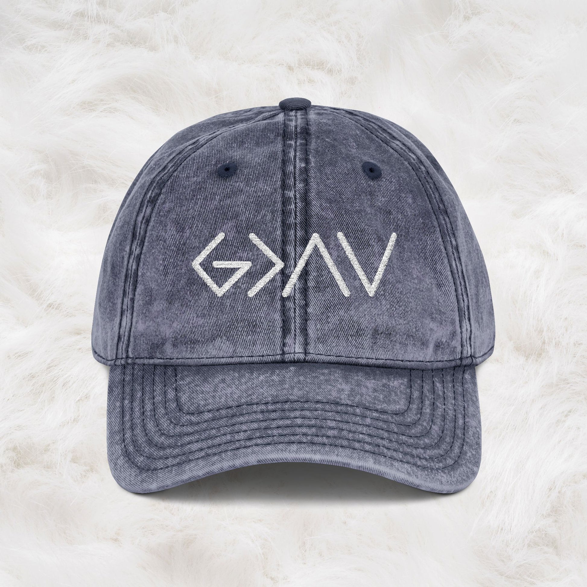Gray cap with 'G>NV' logo on a light gray background